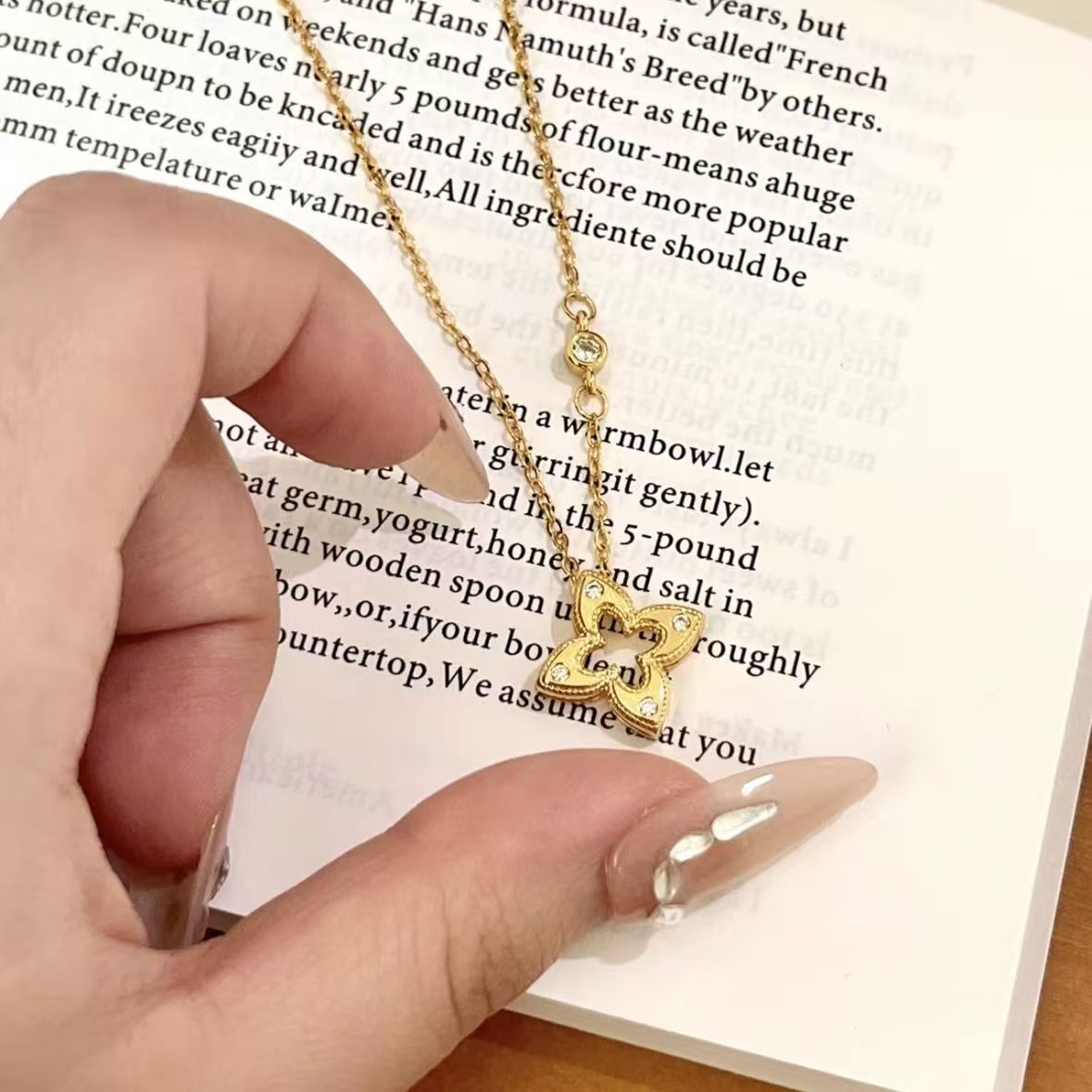 View Delicate Gold Clover Necklace with Sparkling Crystals image 2