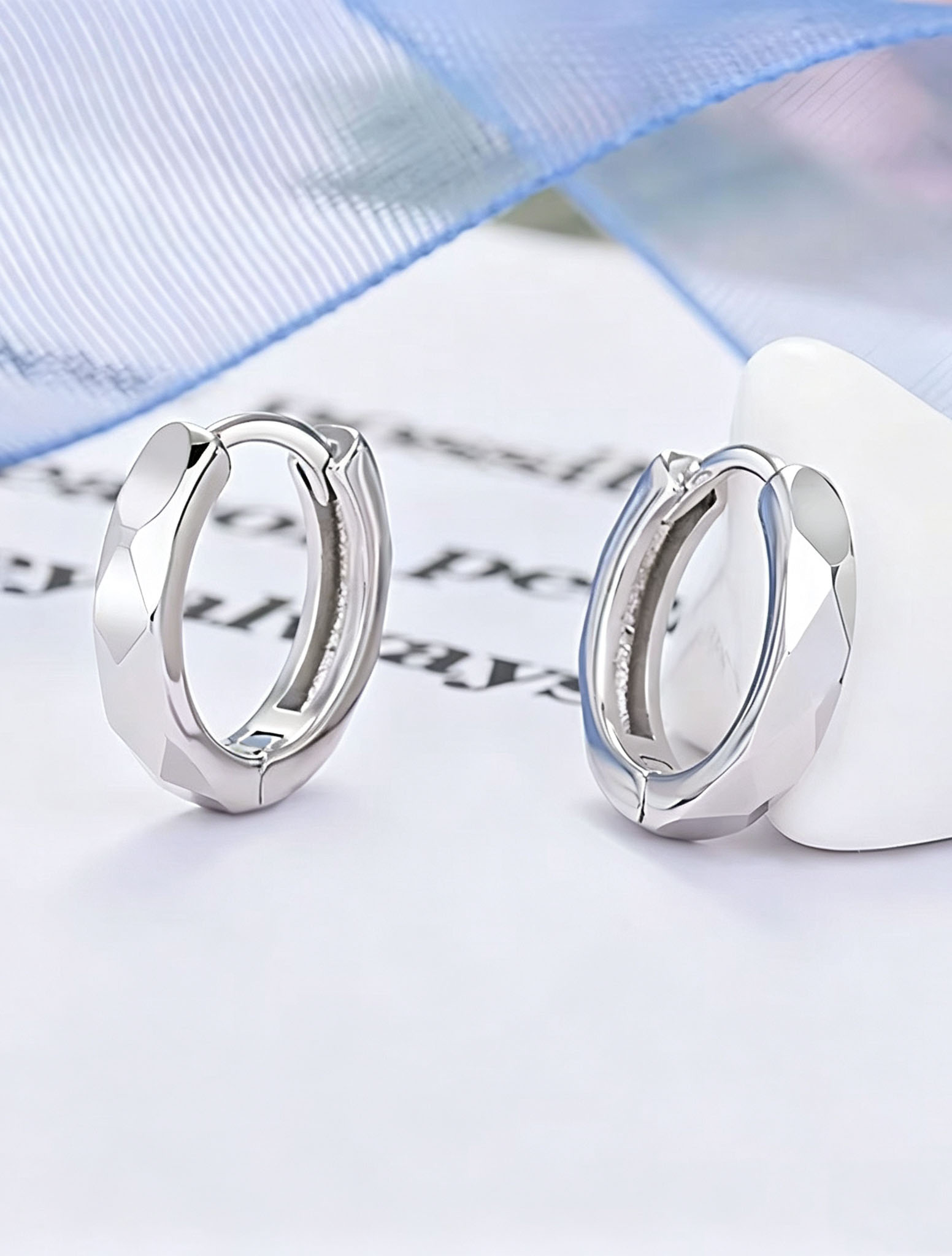 View Faceted Titanium Steel Gold Huggie Hoop Earrings image 3
